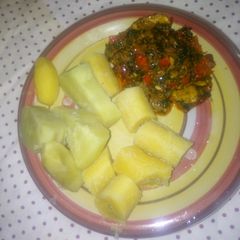 Boiled sweet potato and plantain with ugwu stew A picture of Boiled sweet potato and plantain with ugwu stew.