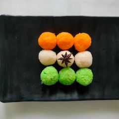 A picture of Tri colour coconut ladoo.