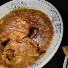 A picture of Chicken tikka masala.