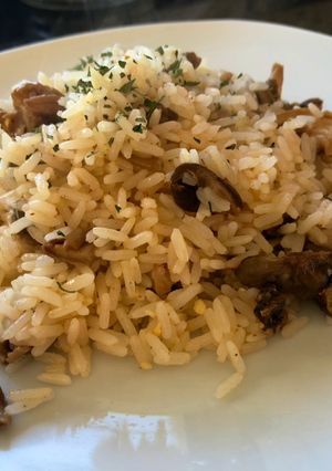 Una foto de Arroz con hongos