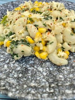 A picture of Spinach sweet corn White sauce pasta.