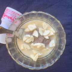 A picture of Ragi Pudding with Yakult.