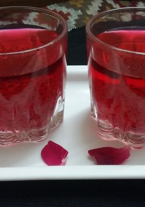A picture of Chia seeds and red drink.