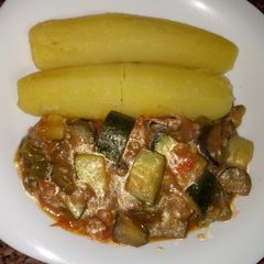 A picture of Last night supper #my style boiled green bananas#author marathon.