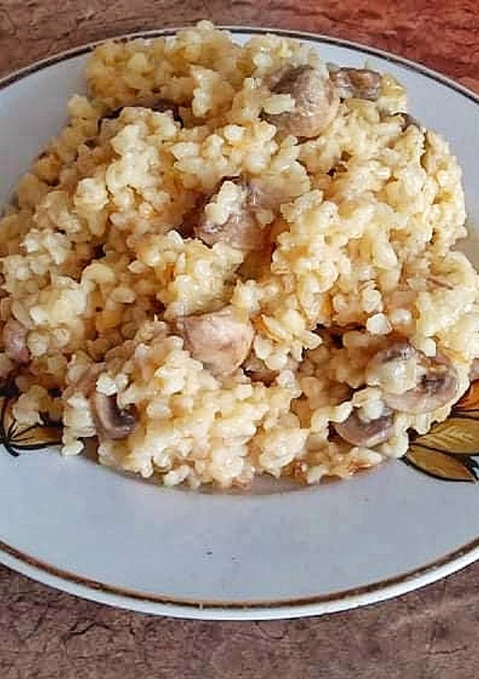 Плов із м'ясом та шампіньйонами