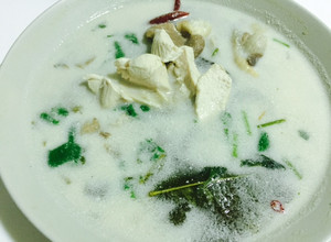 A picture of Galangal chicken coconut soup.