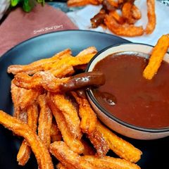 A picture of Mexican Churros with Hot Chocolate, Eggless.