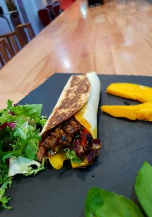 Una foto de Burrito de Presa Ibérica y mango