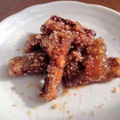 A picture of Fried Burdock Root with Sweet & Salty sauce.