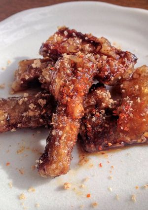 A picture of Fried Burdock Root with Sweet & Salty sauce.