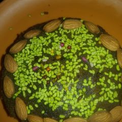 A picture of Biscuit cake with Almonds.