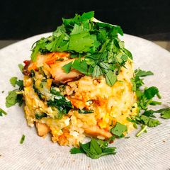 A picture of Fried Rice with Purple broccoli and Eggs  🥦🥚.