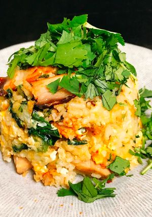 A picture of Fried Rice with Purple broccoli and Eggs  🥦🥚.
