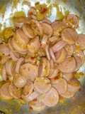Salchichas a la mostaza con vino blanco