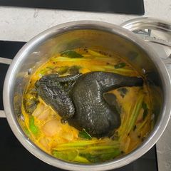 A picture of Black Chicken with Turmeric Soup.