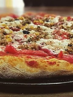 Una foto de Pizza vegana de atún