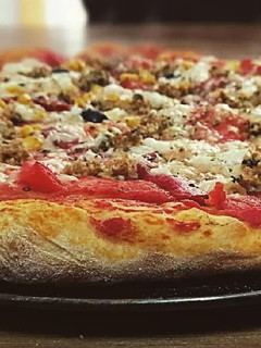 Una foto de Pizza vegana de atún