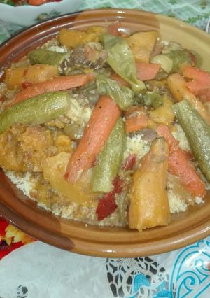 A picture of Couscous with Meat and Vegetables.