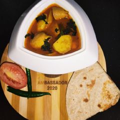 A picture of Three Spices Arvi And Chicken Gravy.