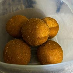 A picture of Moong Ladoo Hesarbale Undi.