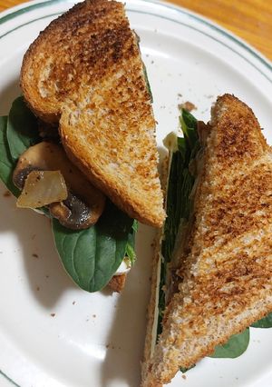 A picture of Cheese Sandwich with Spinach and Mushrooms.