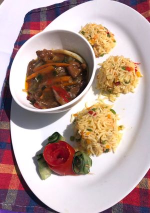 A picture of Vegetable fried rice and shredded beef sauce.