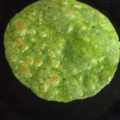 A picture of Palak paneer paratha.