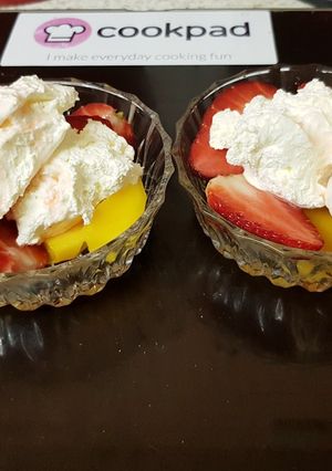 A picture of A Strawberry Treat with fresh whipped cream 💖.