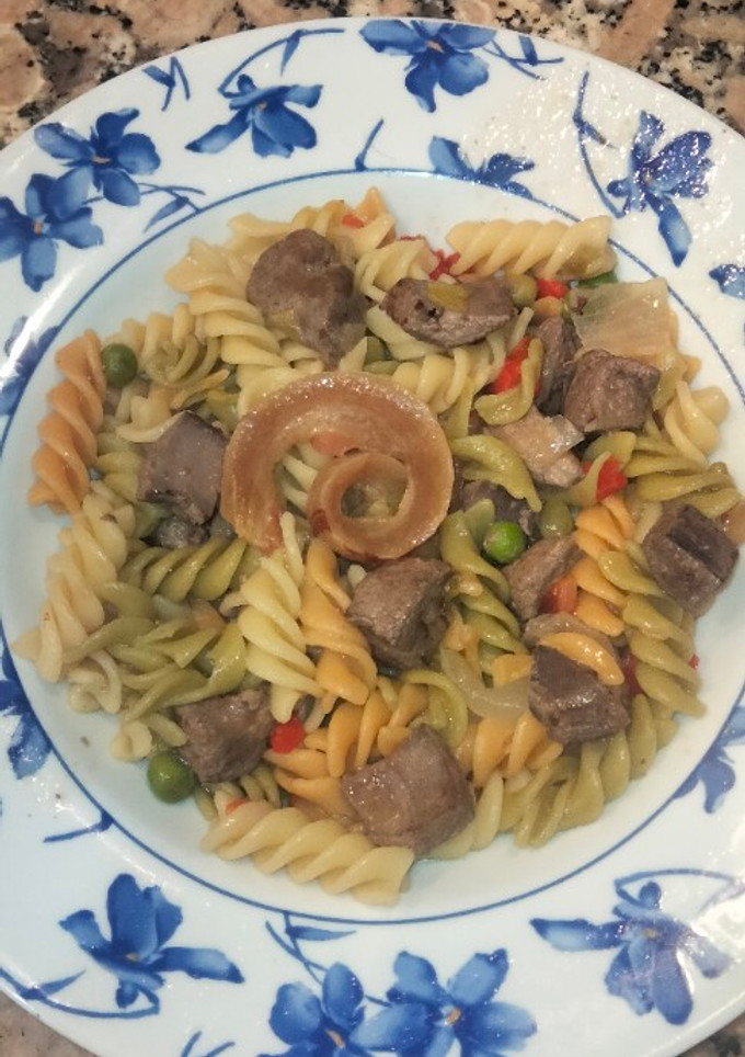 Una foto de Hígado con Rizos y Vegetales