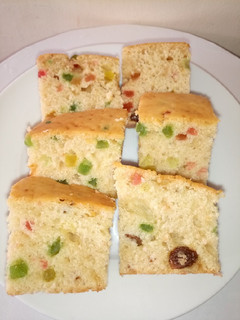 A picture of Eggless vanilla tutti frutti cake.