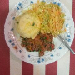 A picture of Creamy mashed potatoes, minced meat and cabbage.