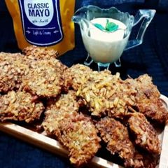 A picture of Green Tikka with Mango Yogurt Sauce.