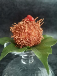 Una foto de Croqueta "despeiná"de gambas y Sriracha