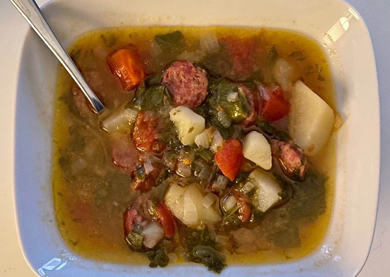 Cabbage soup with potatoes and sausage