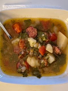 A picture of Kale Soup with Potatoes and Sausage.