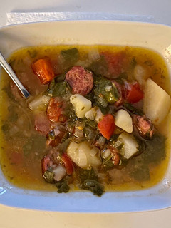 A picture of Kale Soup with Potatoes and Sausage.