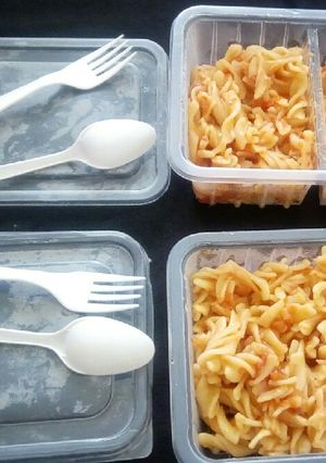 A picture of Pasta dipped in tomato soup by Seline & Christine.