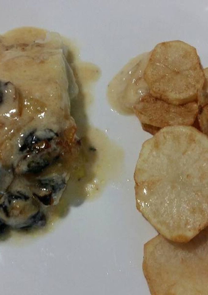 Una foto de Bacalao al horno con bechamel y pasas