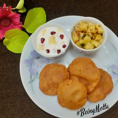 A picture of Amaranth Poori with Aloo sabzi.