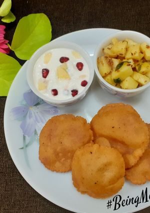 A picture of Amaranth Poori with Aloo sabzi.