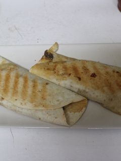 Una foto de Tacos de congrio con verduras al horno