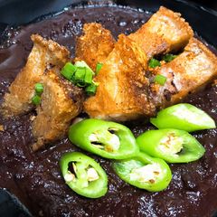 A picture of Crispy Pork Blood Stew (Dinuguan).
