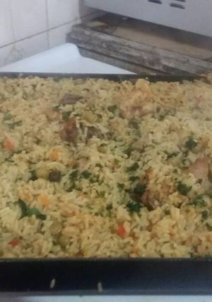 Una foto de Arroz con pollo en la plancheta