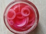 A picture of pickled red onion