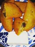 Empanadas de maíz amarillo rellenas de carne molida