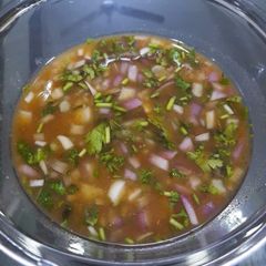 A picture of Tamarind (imli)onion /potato chutney.