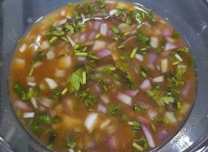 A picture of Tamarind (imli)onion /potato chutney.