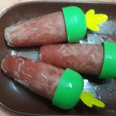 A picture of      Watermelon popsicle.