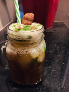 A picture of Sugarcane juice with mint.