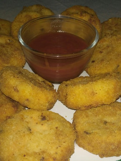 Una foto de Croquetas de papa, panceta y cheddar